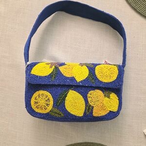 Vibrant Blue Beaded Shoulder Bag with Lemon Design